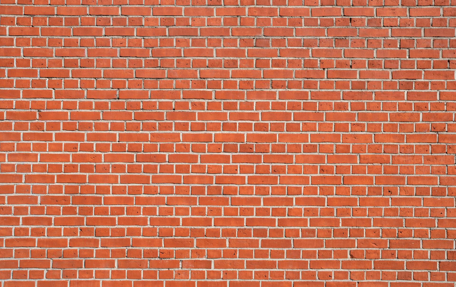 Warm brick wall in running bond