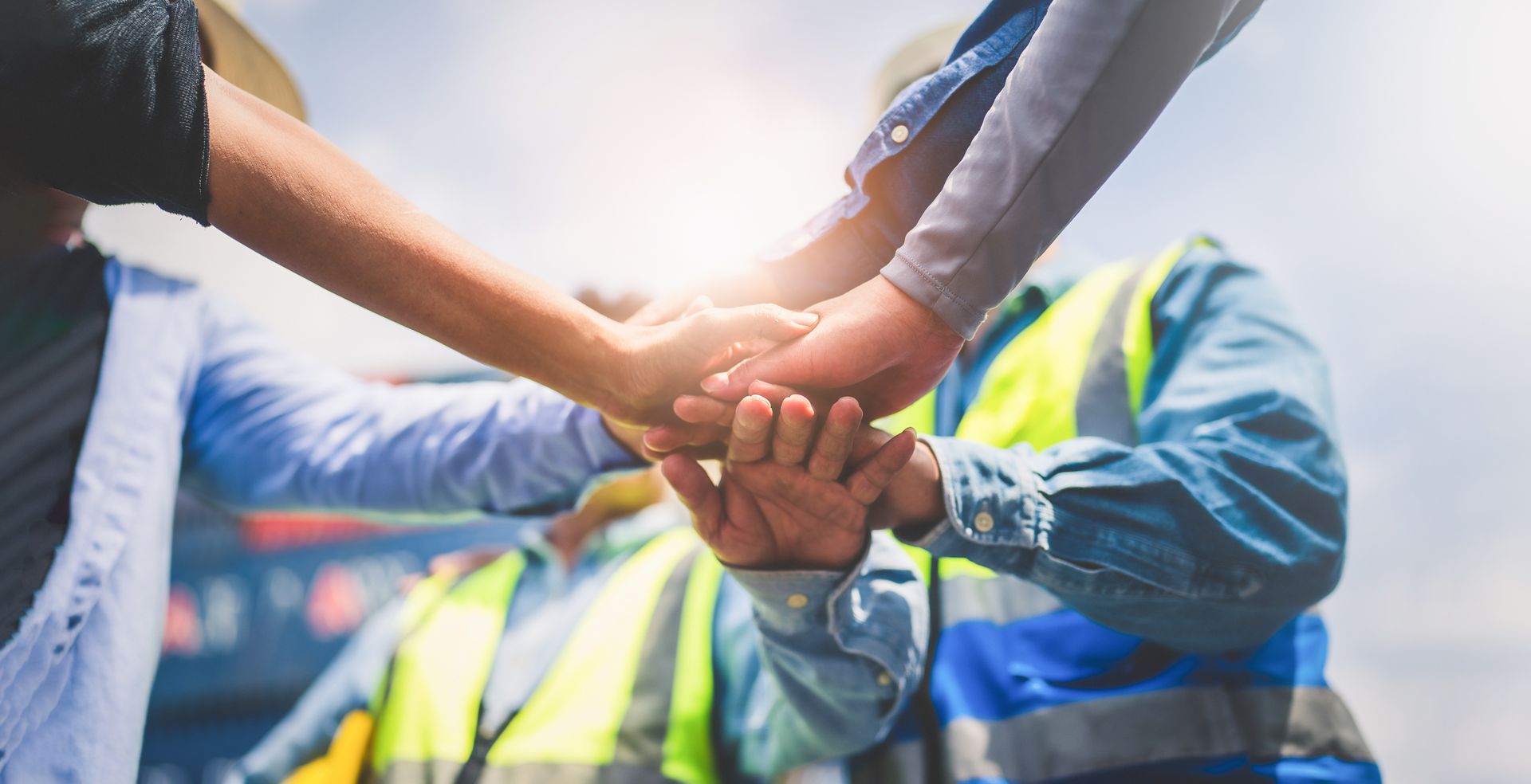 Hands stacked together in teamwork